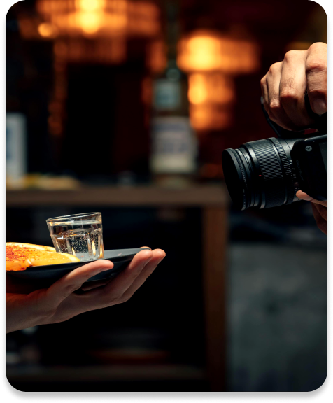 Photograph being taken of a food dish